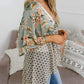 🧥 50% DE RÉDUCTION 🌸 Cardigan femme à fleurs, manches volantées & nouer – Style bohème fluide & ample – Léger, aéré – parfait pour le printemps ou les soirées d’été – romantique et décontracté 🌿